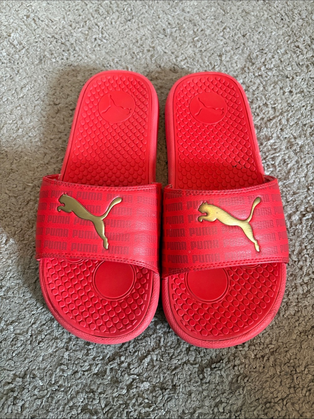 Puma Red Slides with Gold Pouncing Cat